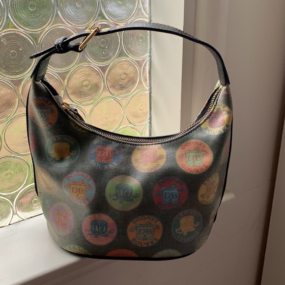 Authentic Dooney and Bourke wax coated handbag with adjustable leather strap - Picture 2 of 16